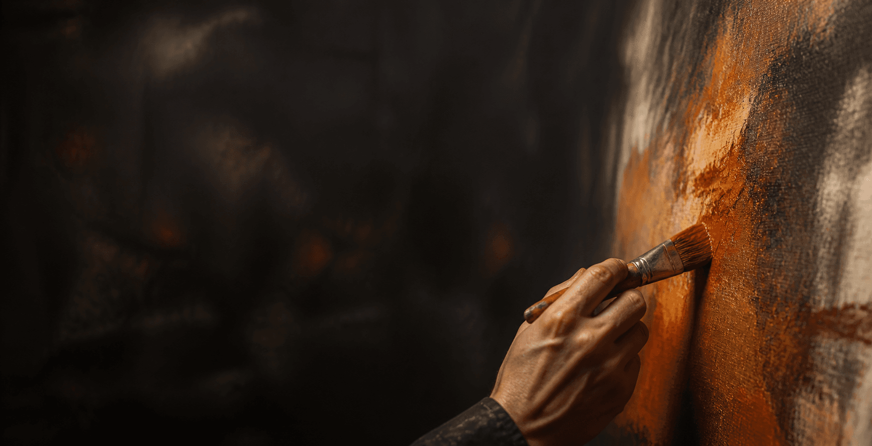 Artist applying burnt-orange pigment to a textured canvas